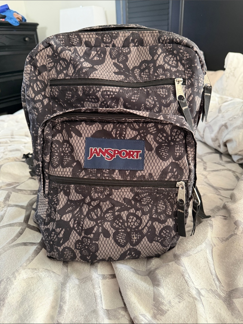 Jansport Black and Taupe Floral Pattern Backpack